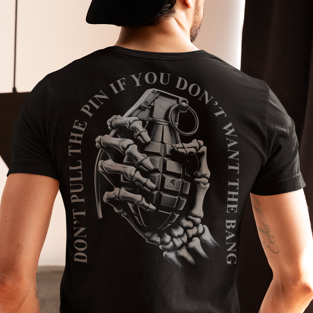 Back view of man wearing black cotton Achilles Tactical Clothing Brand with morale slogan across back