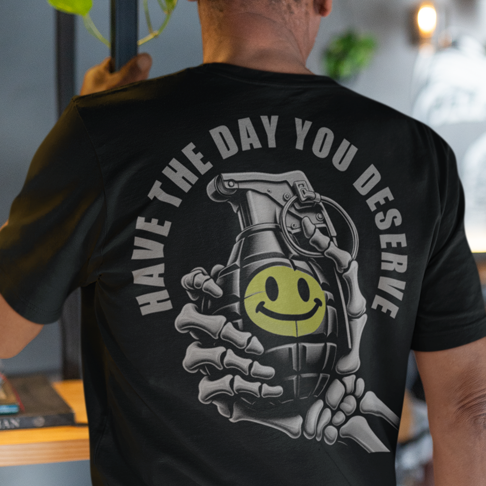 Back view of man wearing Black short sleeve unisex fit classic cotton T-Shirt by Achilles Tactical Clothing Brand printed with the day you deserve design across back