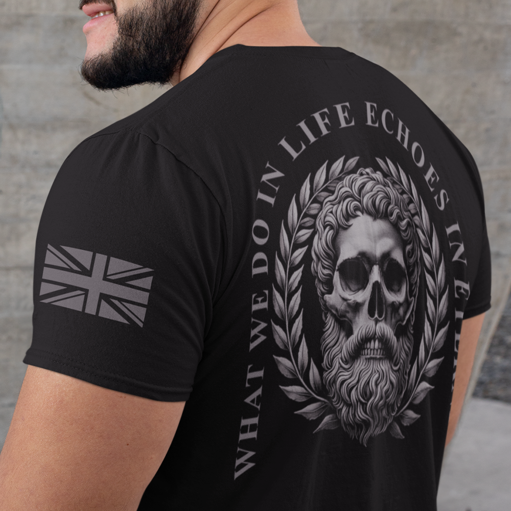 Back view of man wearing black short sleeve unisex fit original cotton T-Shirt by Achilles Tactical Clothing Brand printed with What we do in life design across back