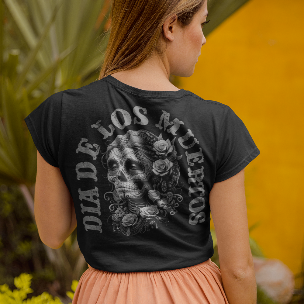 Back view of woman wearing black short sleeve unisex fit classic T-Shirt by Achilles Tactical Clothing Brand Dia De Los Muertos design