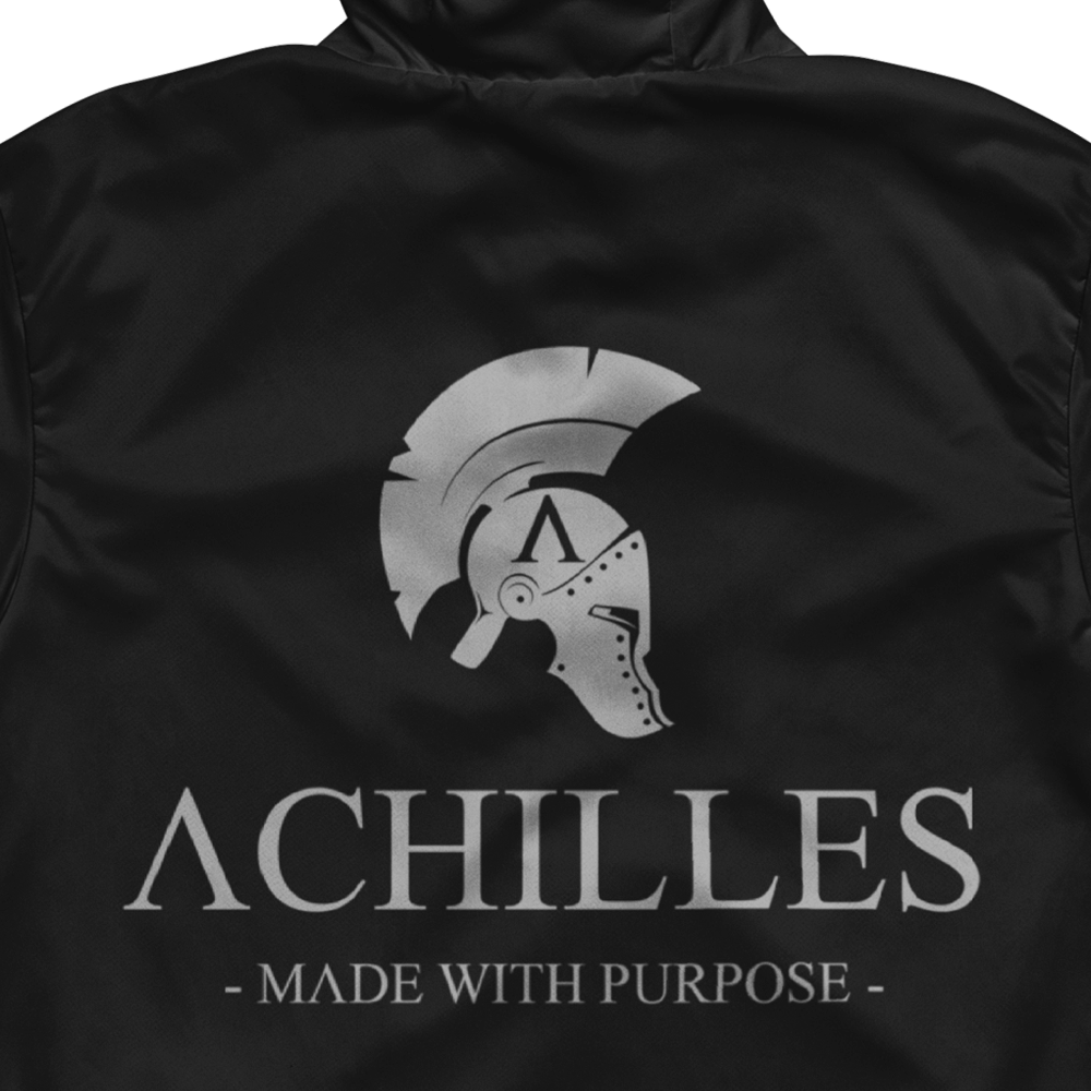 Close up of back view of long sleeve unisex fit windbreaker track jacket by Achilles Tactical Clothing Brand printed with Achilles Signature logo in wolf grey across back