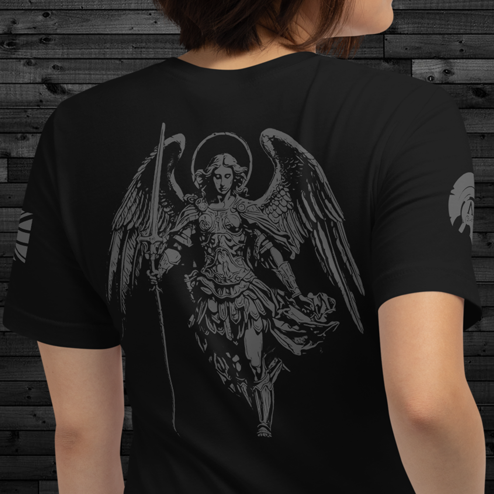 Close up of back of woman wearing black cotton Achilles Tactical Clothing Brand short sleeve unisex T-Shirt with Saint Michael design printed on back in Wolf Grey