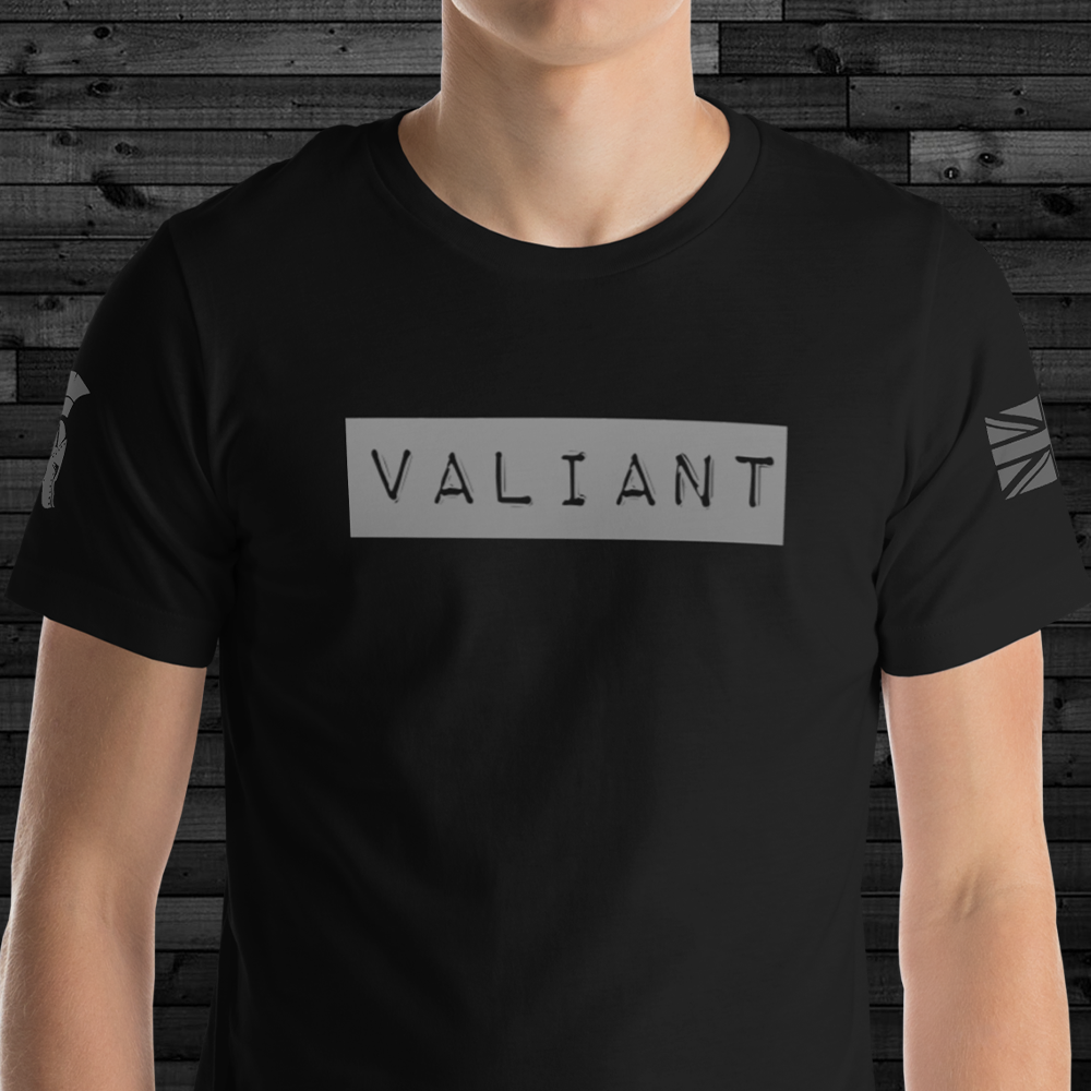 Close up of front of man wearing black cotton Achilles Tactical Clothing Brand t-shirt with wolf grey Valiant wording printed across chest