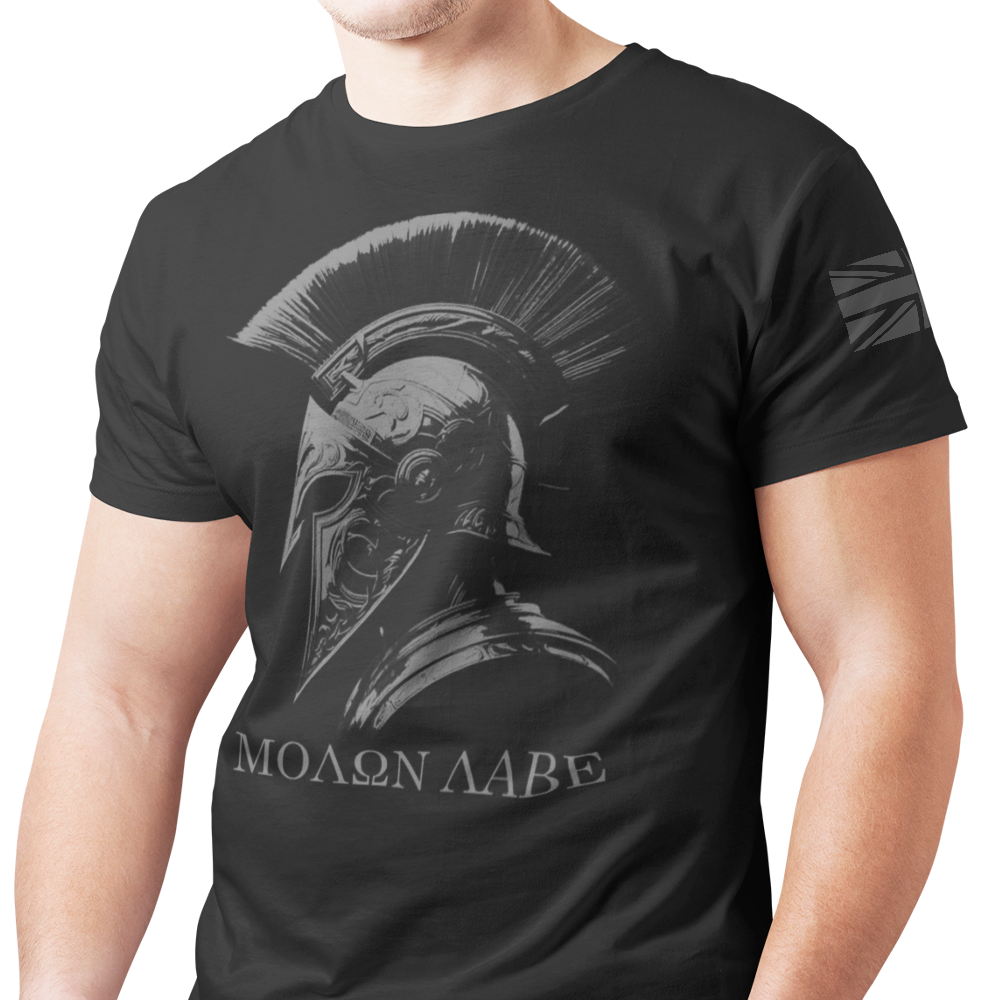 Front view of man wearing Black short sleeve classic cotton unisex fit T-Shirt by Achilles Tactical Clothing Brand with screen printed Molon Labe design