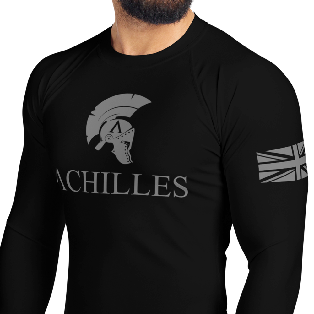 Front left view of man in black long sleeve unisex fit Rash Guard by Achilles Tactical Clothing Brand with Signature design in grey