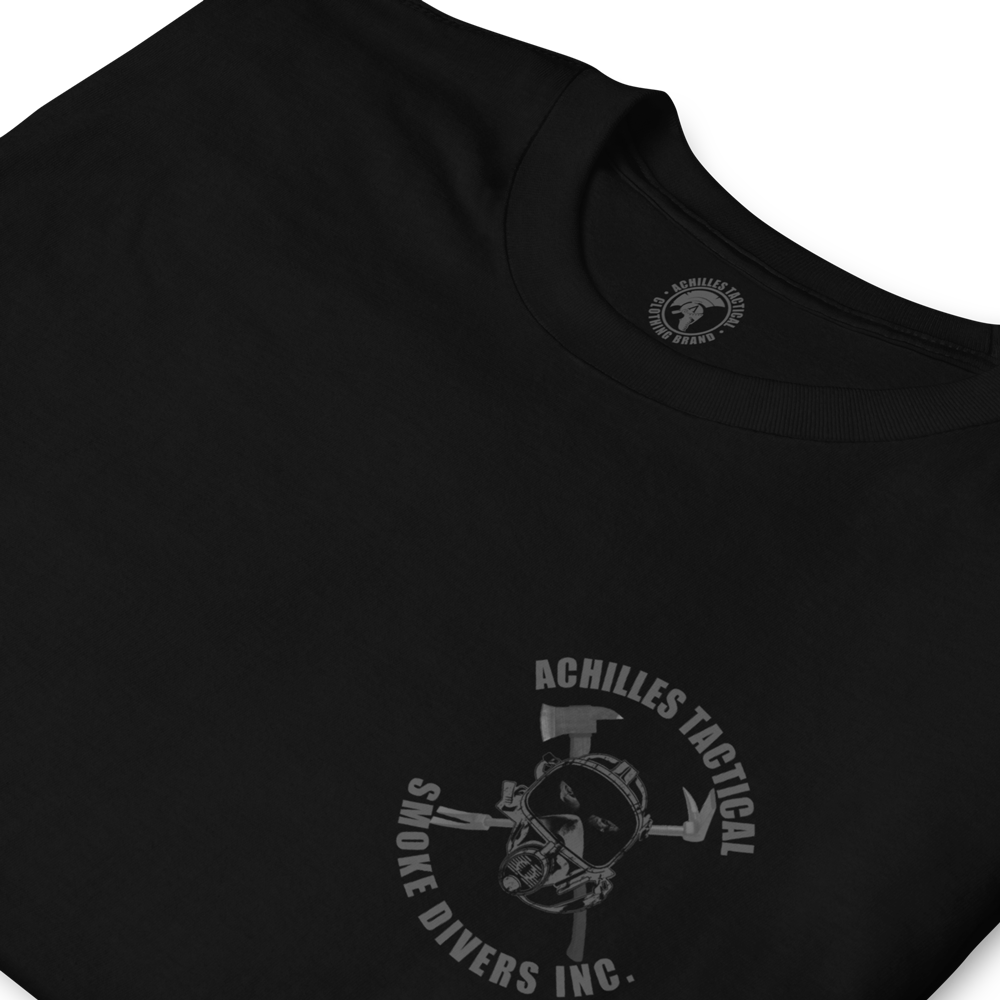 Close up of Front of Black Cotton short sleeve unisex fit T-Shirt by Achilles Tactical Clothing Brand with Smoke Divers inc. firefighter Logo design across the Front left chest