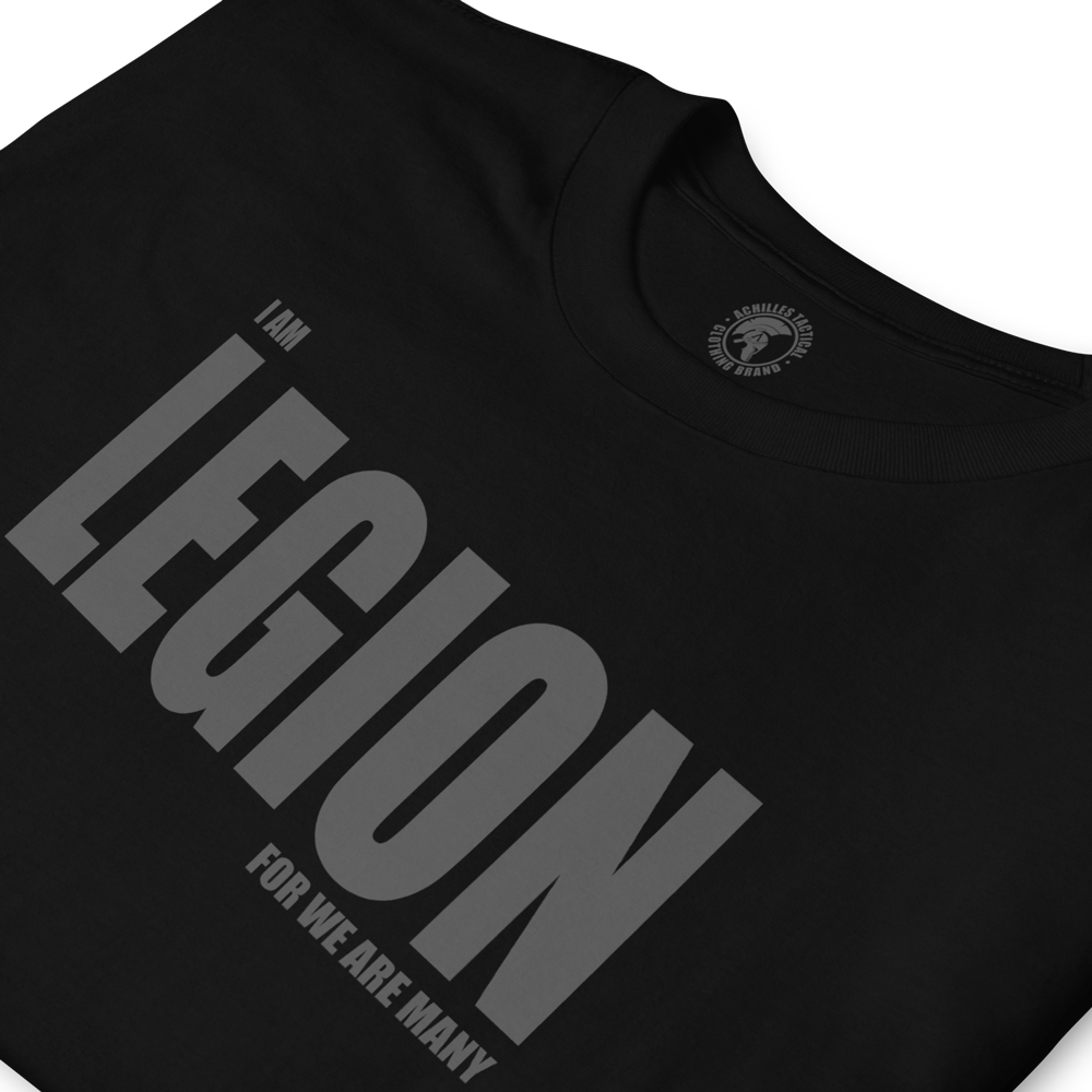Close up of folded Front view of Black short sleeve unisex fit cotton T-Shirt by Achilles Tactical Clothing Brand printed with Legion wording across the Front