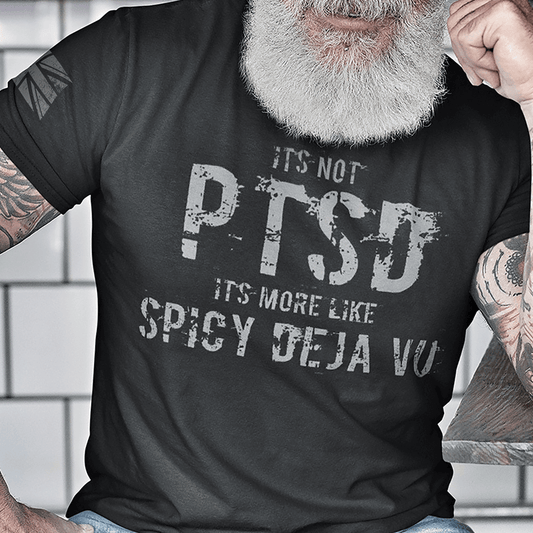 Man wearing Black short sleeve unisex fit cotton T-Shirt by Achilles Tactical Clothing Brand printed with PTSD Slogan Spicy Deja Vu across the chest by Achilles Tactical Clothing Brand