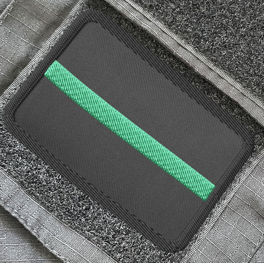 Thin Green Line rectangle embroidered patch by Achilles tactical clothing brand